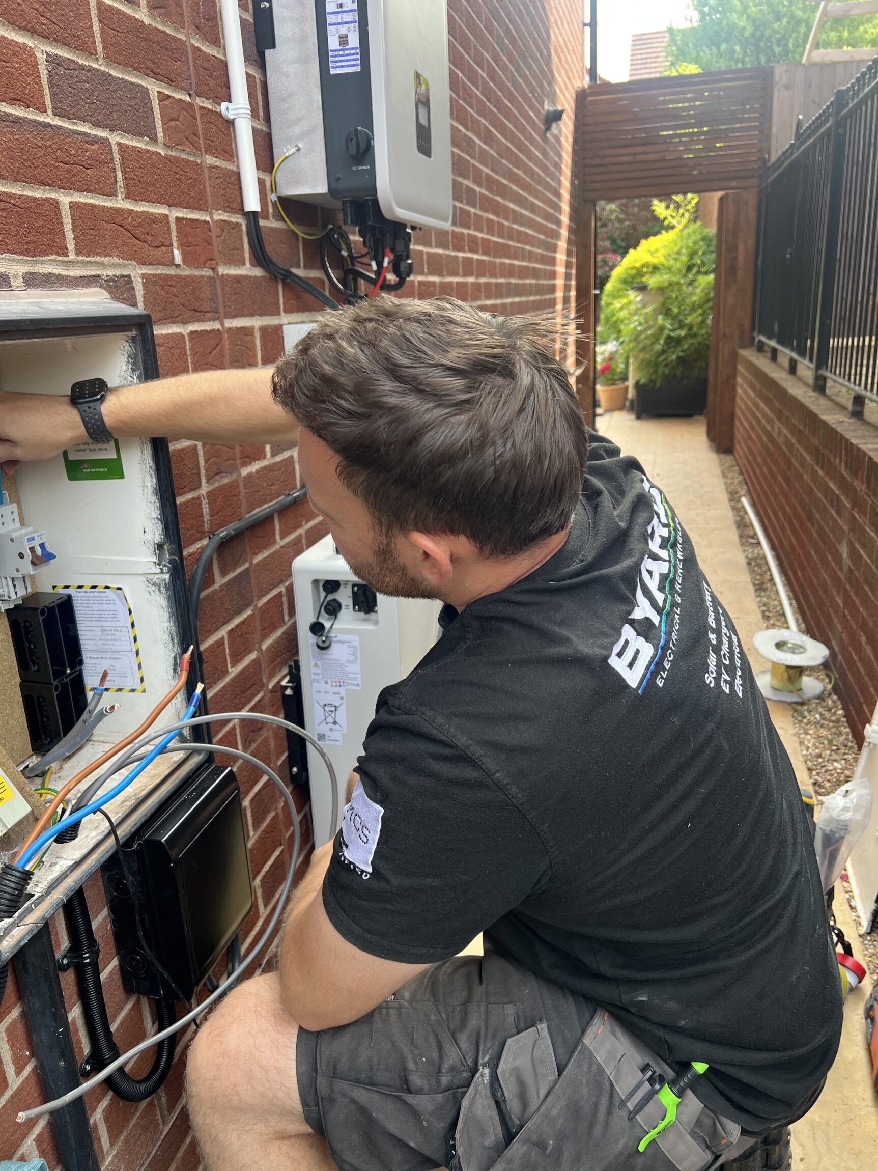 Local domestic electrician in Gloucester installing light