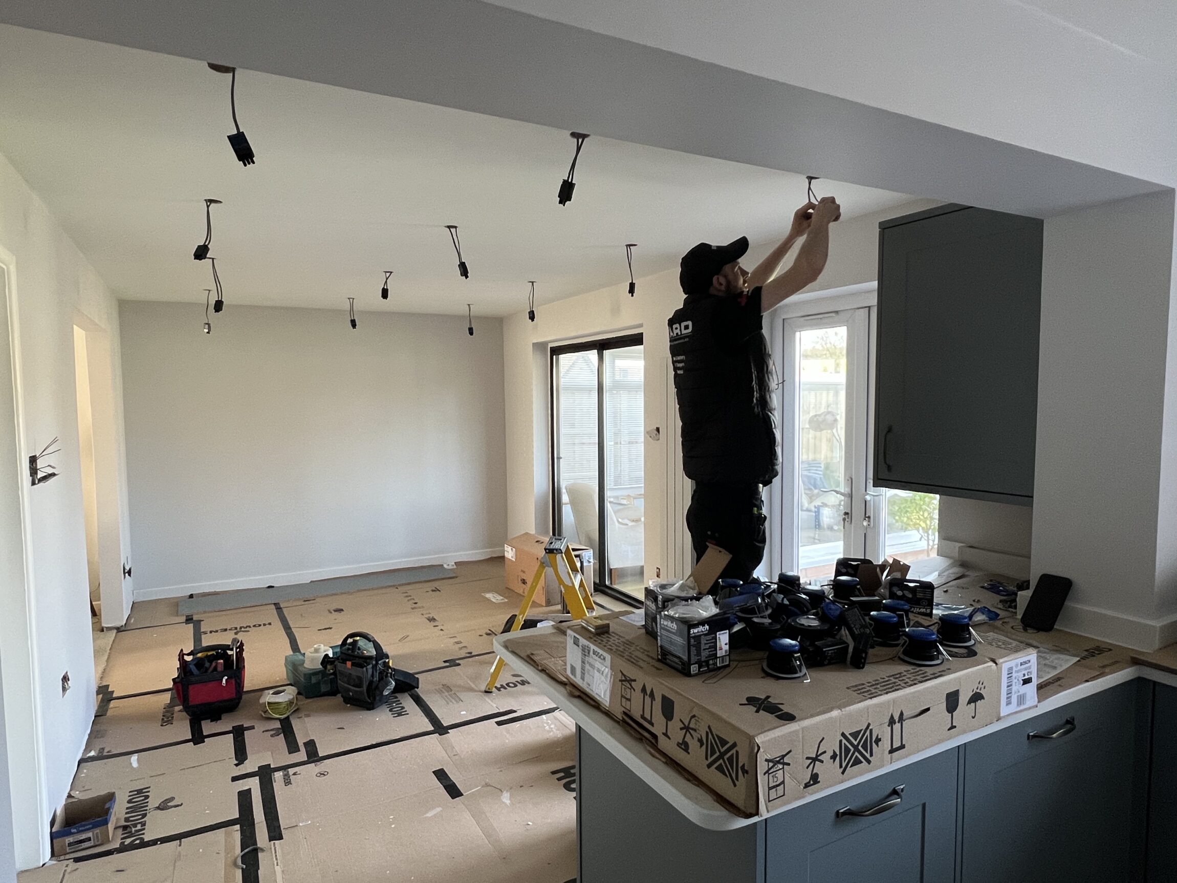 domestic gloucester electrician installing light fitting